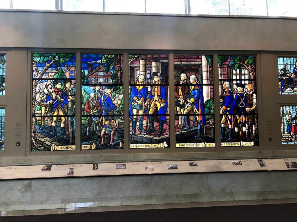 several panels of stained glass create a portrait of the founding fathers at Mount Vernon