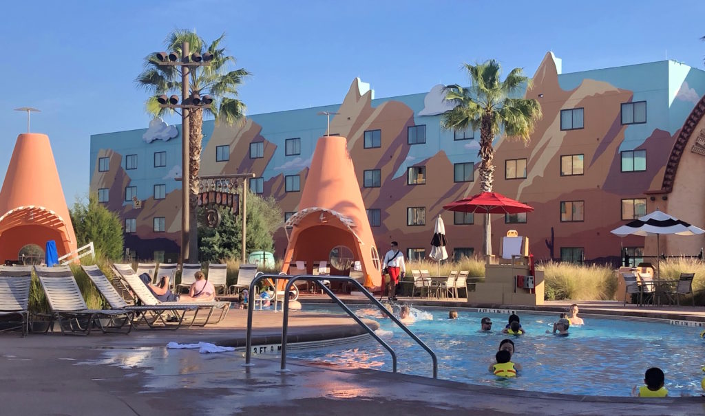 the Cozy Cone Pool is lined with cone-shaped cabanas