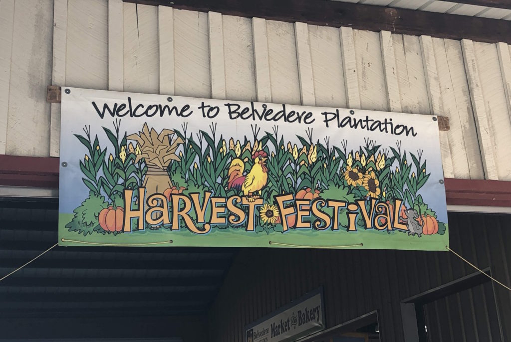 banner that reads "Welcome to Belvedere Plantation Harvest Festival"