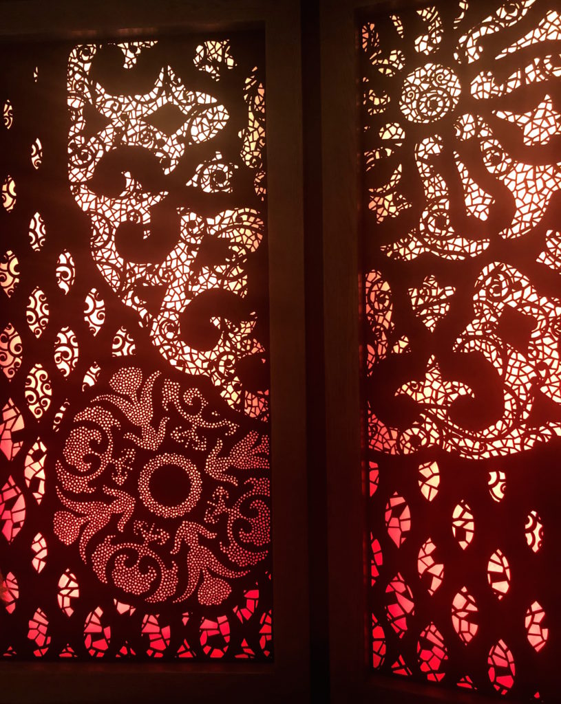 bold, backlit floral motifs in the check-in area of the lobby of Disney's Coronado Springs: Gran Destino Tower