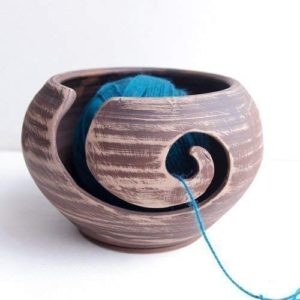 a rustic, ceramic yarn bowl