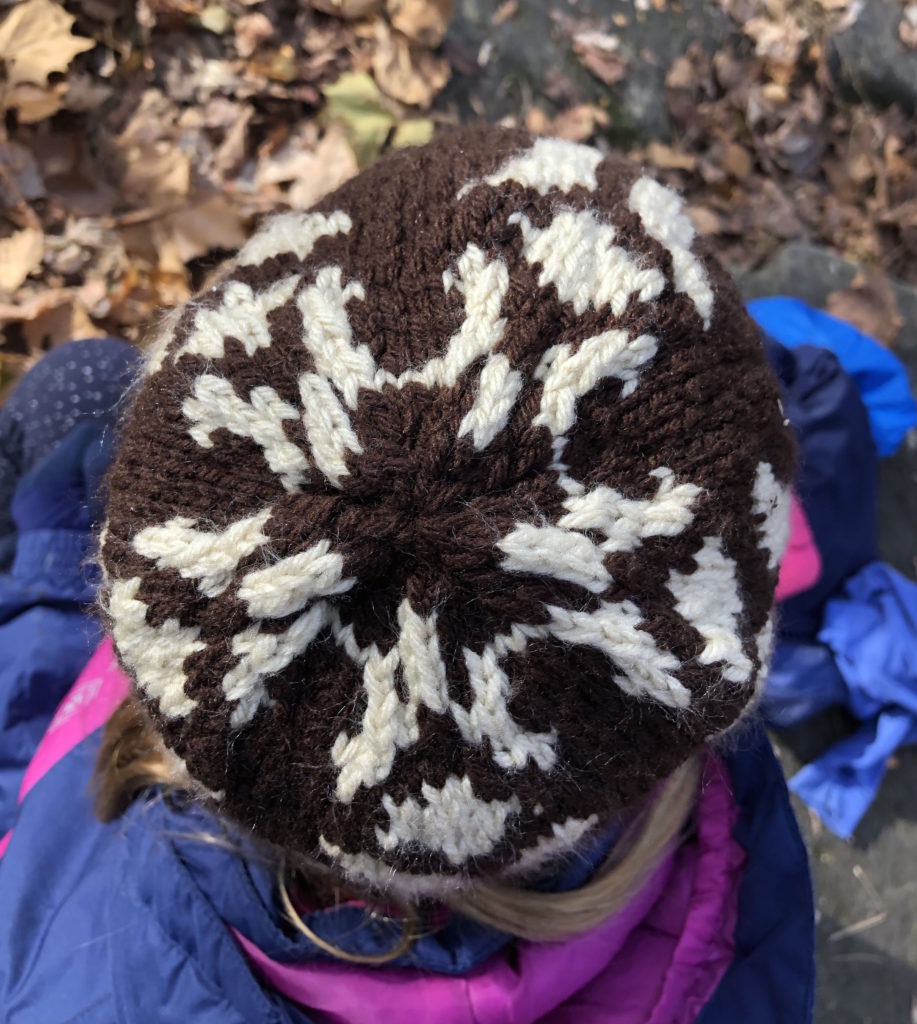 a crown-down view of the Dahlia knitted cap