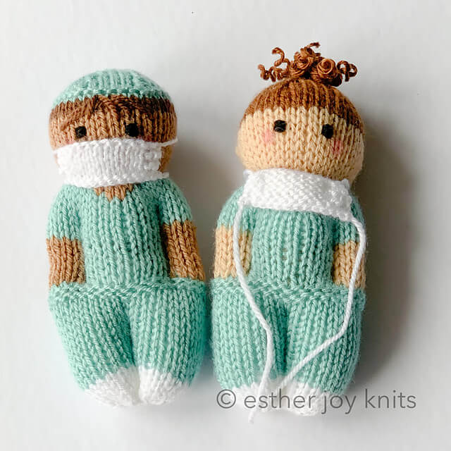 knitted male and female nurse dolls with masks and scrubs