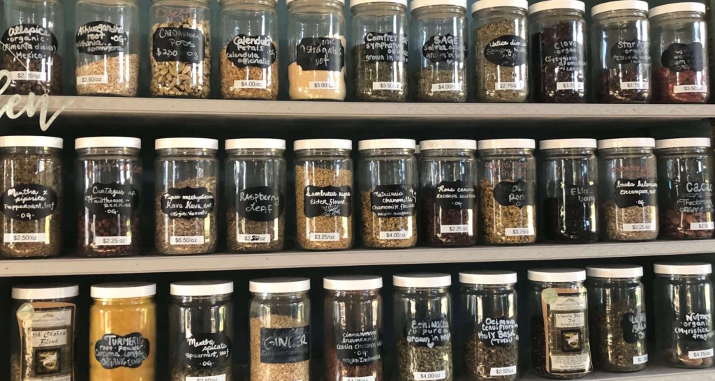 jars of herbs line the shelves
