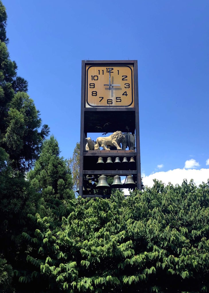 a clocktower with marching animals and 8 working bells displays 3:00PM