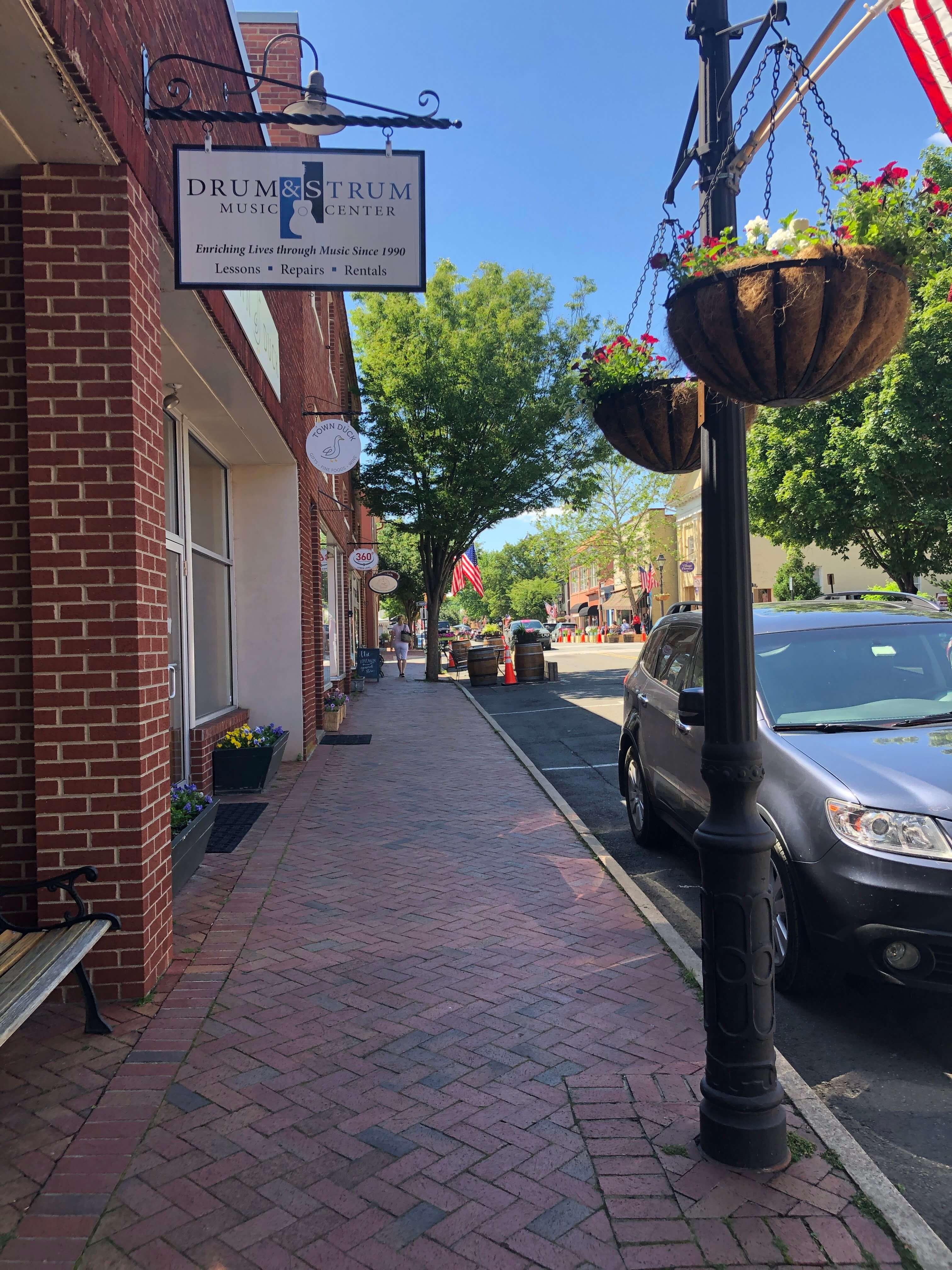 a brick street in a small towntown area