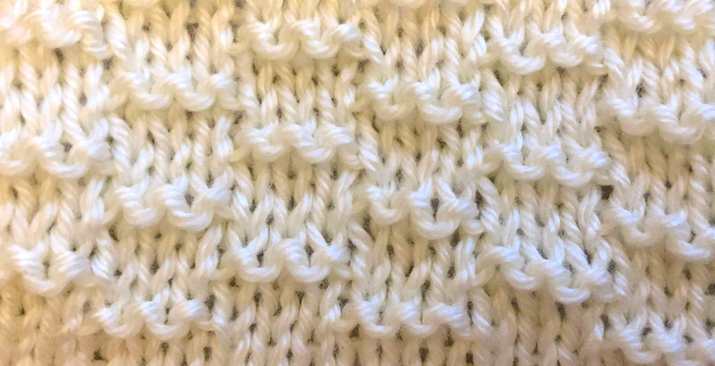 a close-up look at Caterpillar knitting stitch