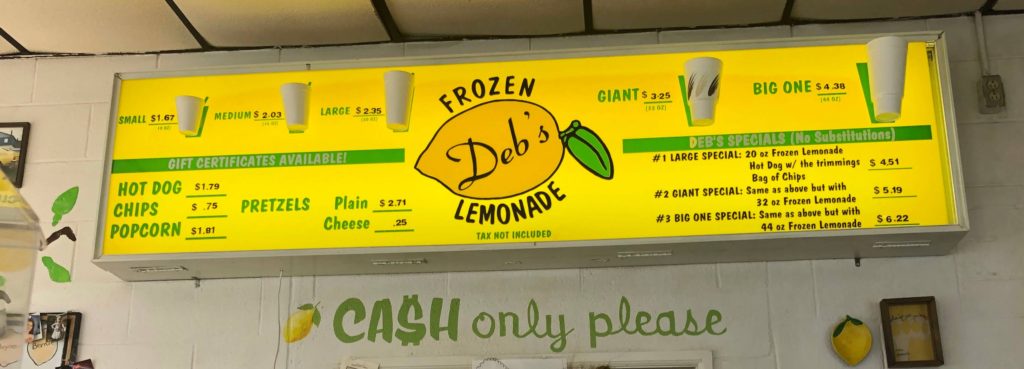 the Deb's Lemonade menu, featuring five sizes of Deb's Lemonade, hot dogs, chips, popcorn, and three special combos