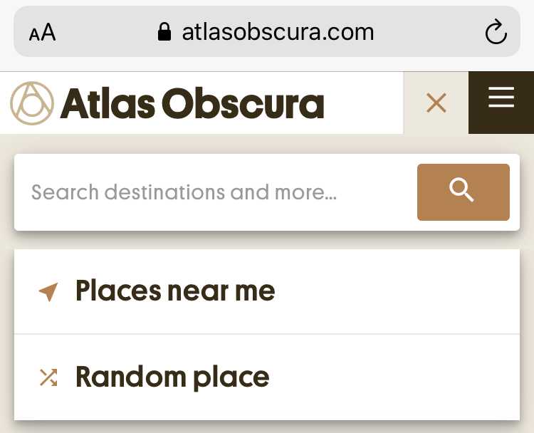 a screenshot of Atlas Obscura shows how to access places nearby or any random place on earth