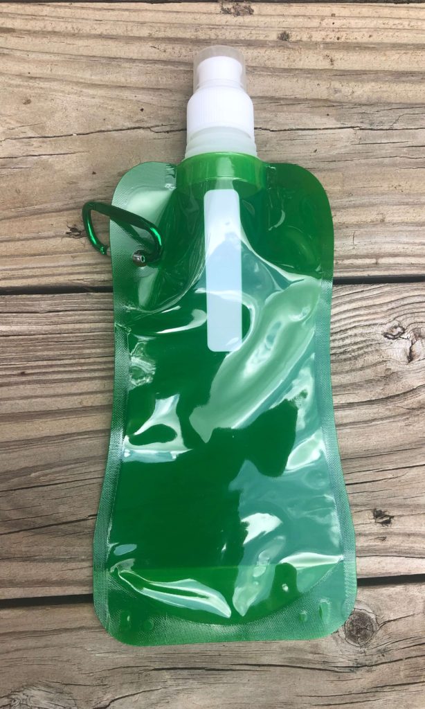 a collapsible water bottle with carabiner clip