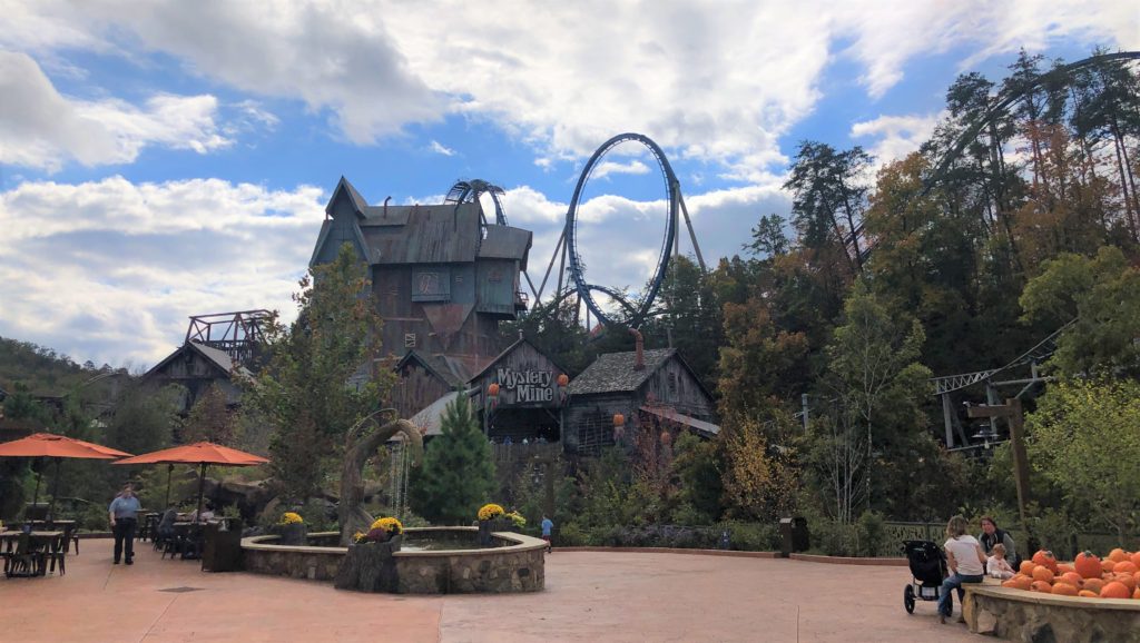 the exterior of Mystery Mine is visible above the treeline