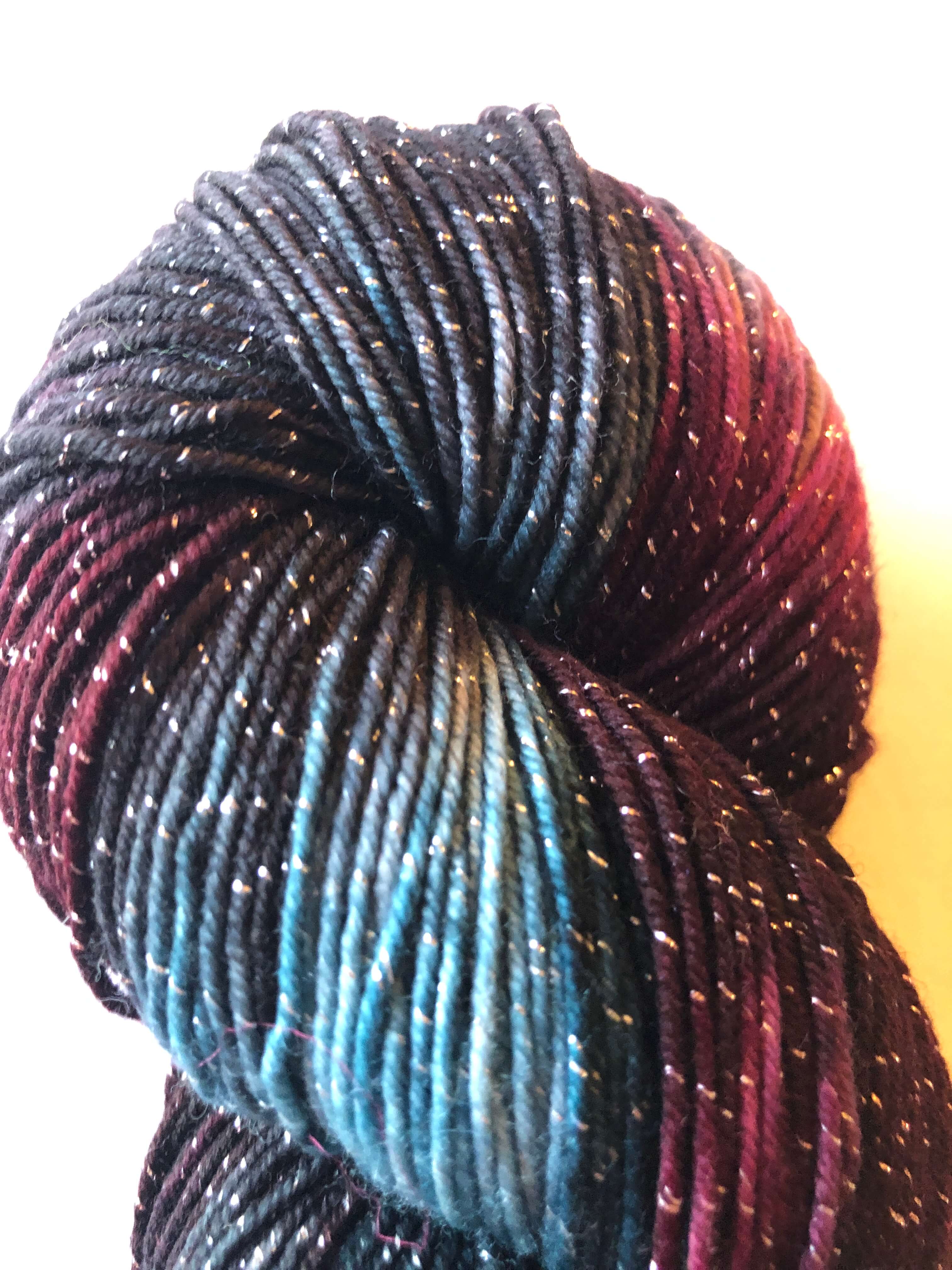 a close-up of the sparkle in Figment yarn by Deep Dyed Yarns in colorway Calling Birds