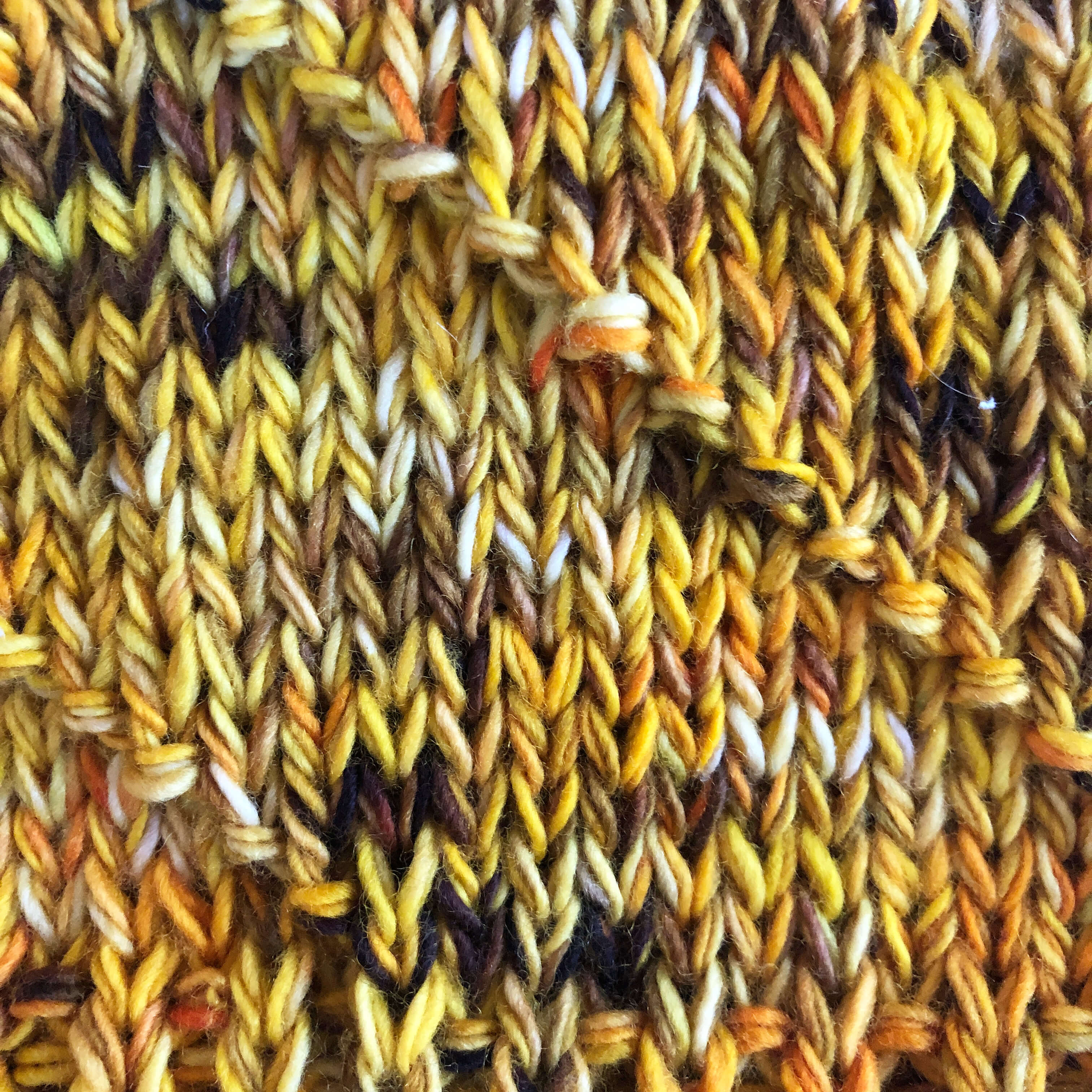 a close-up view of the Purl Swirl pattern