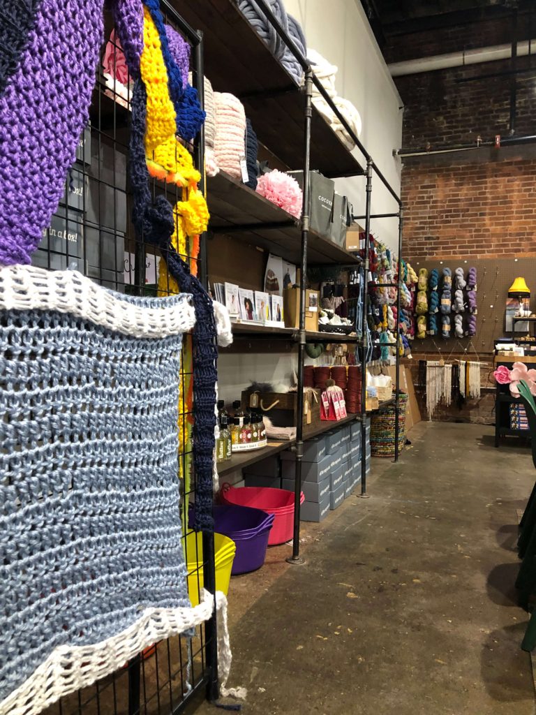 a close-up of the shelves at Rocktown Yarn