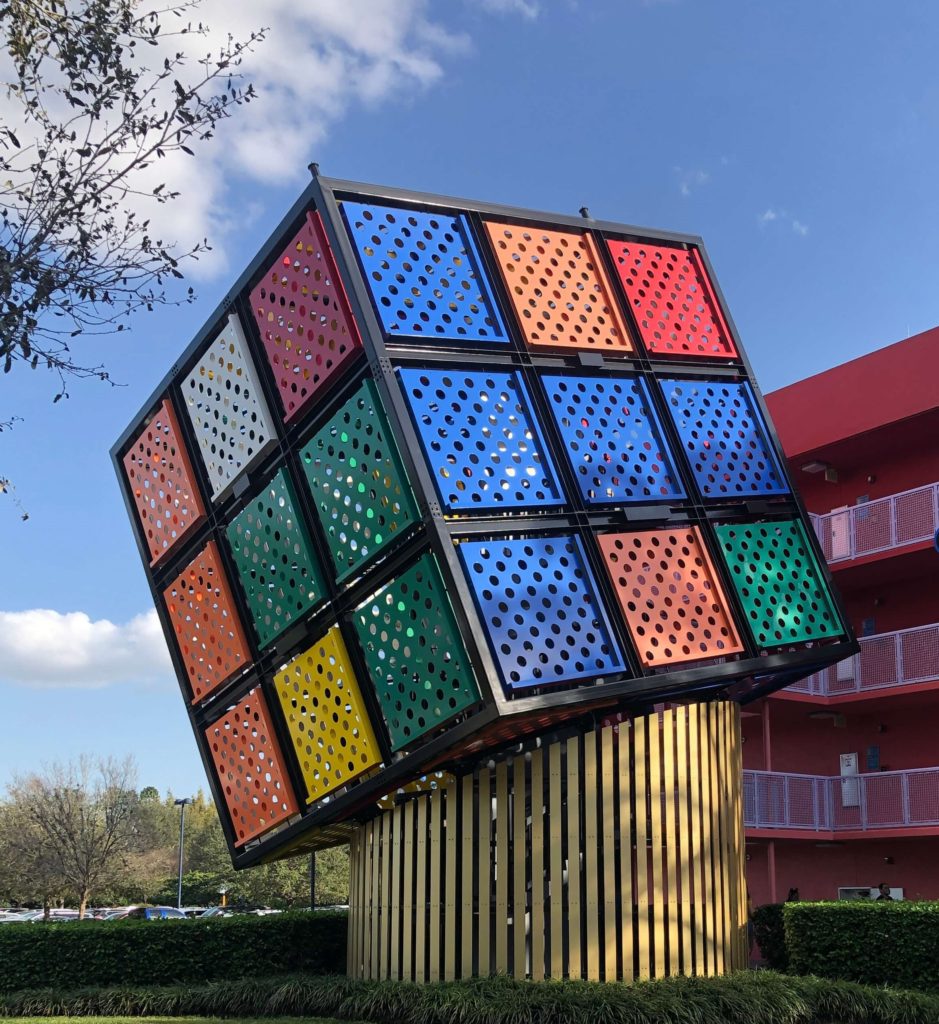 a four-story Rubik's cube surrounds a stairwell
