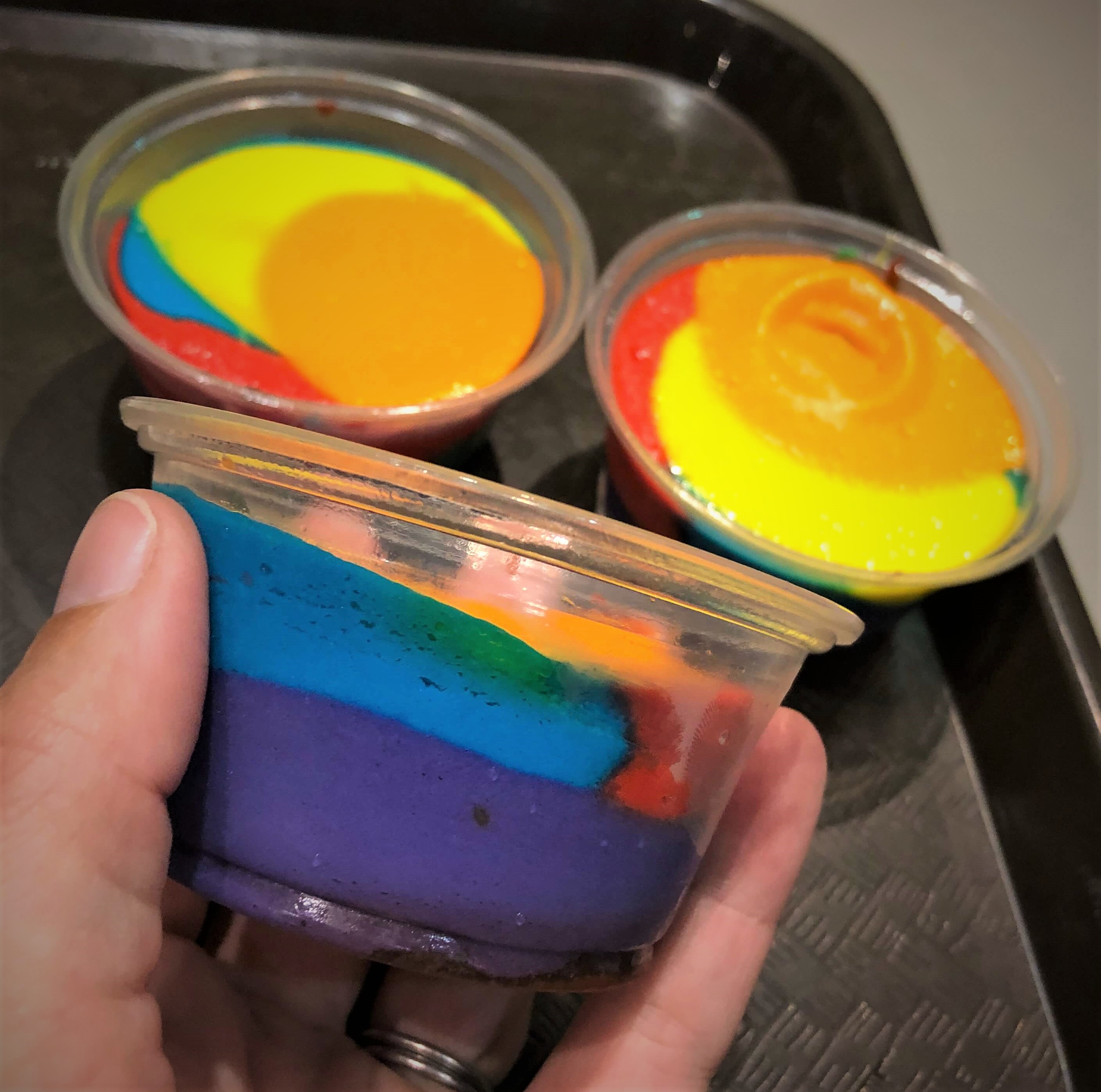 three tie-dye cheesecake cups