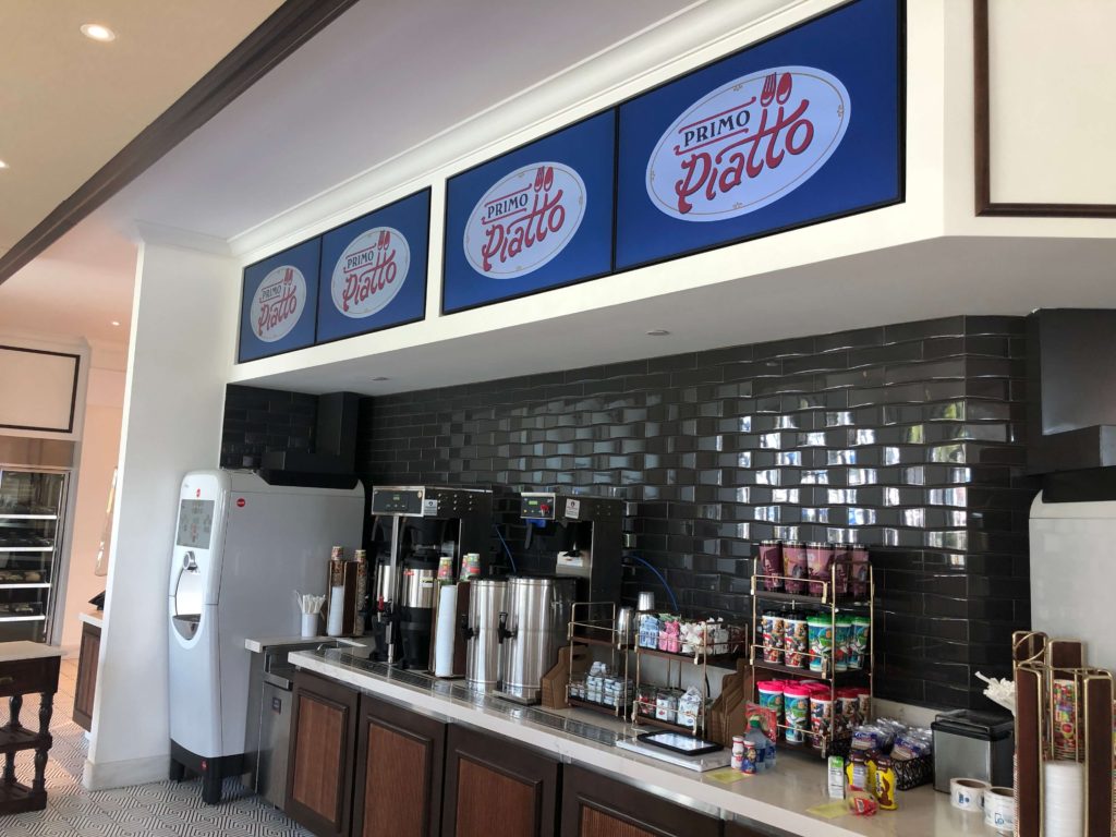 the extensive beverage station at Primo Piatto serves coffee, tea, and Coca-Cola from a Freestyle machine