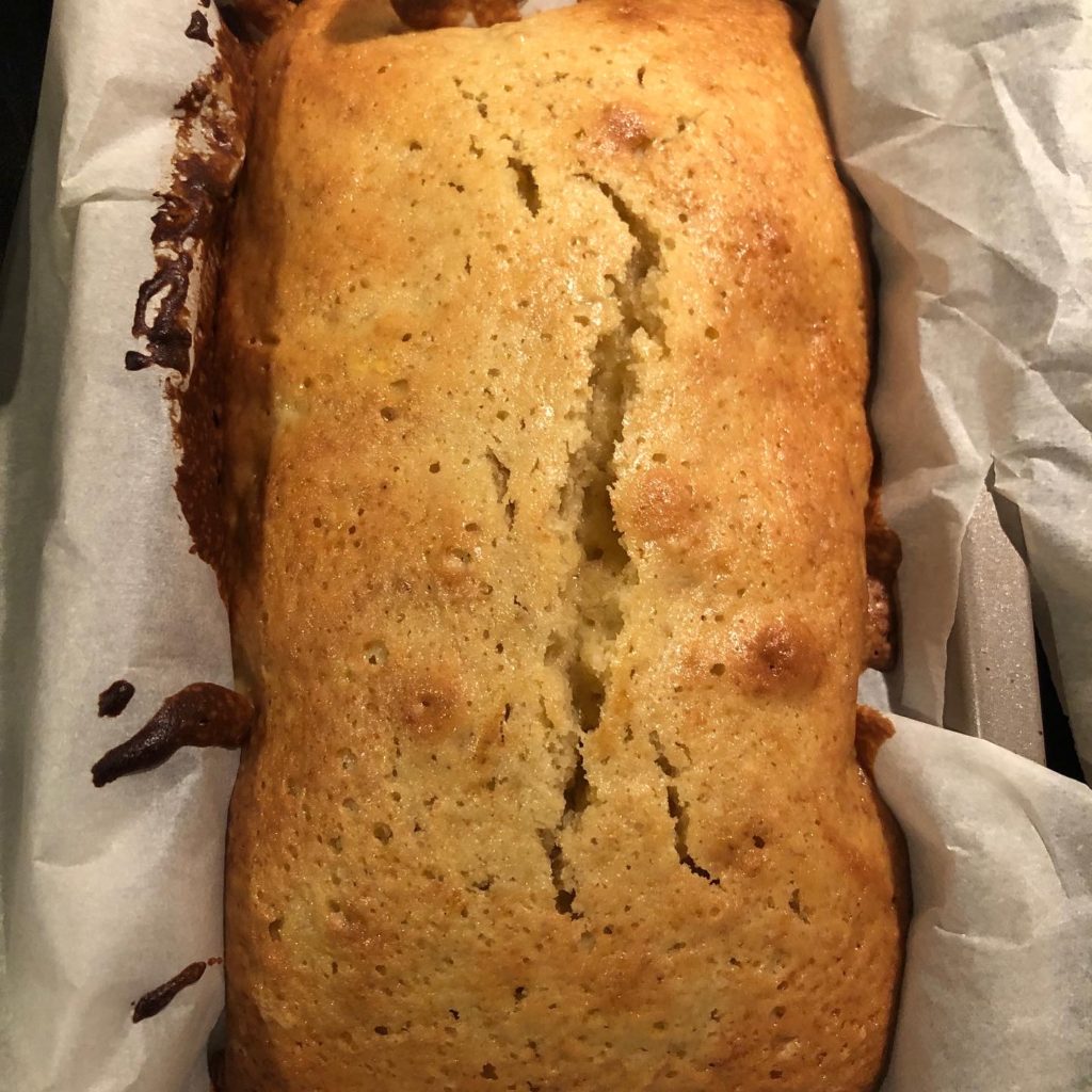 a large, crusty loaf of pawpaw bread fresh from the oven