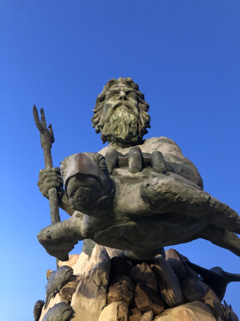 the King Neptune statue stands with a trident and sea turtle at the Virginia Beach Oceanfront