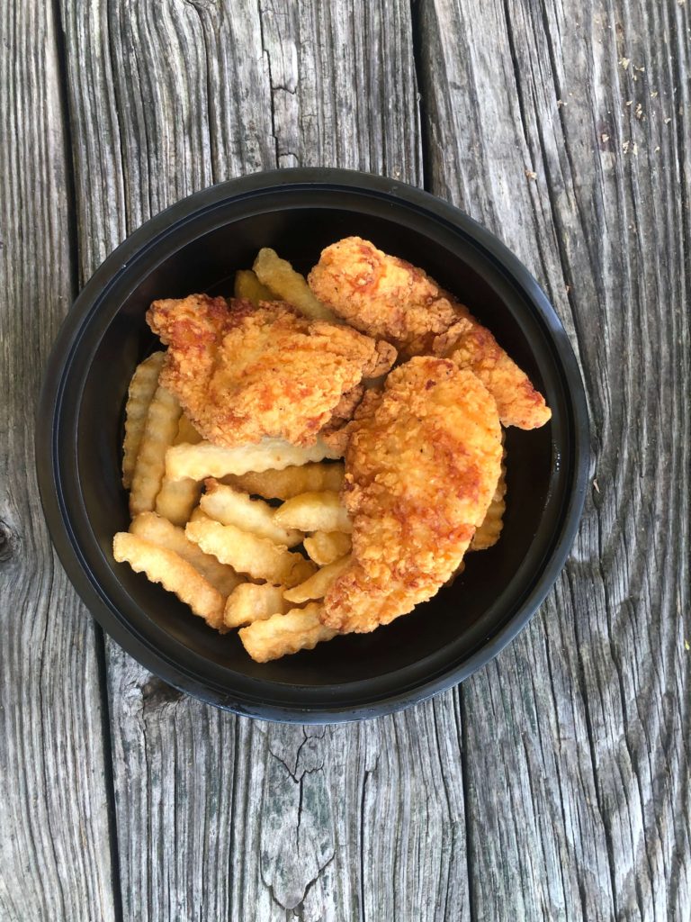 a kids meal from Pierce's Pitt Bar-B-Que  featuring chicken tenders and crinkle-cut fries