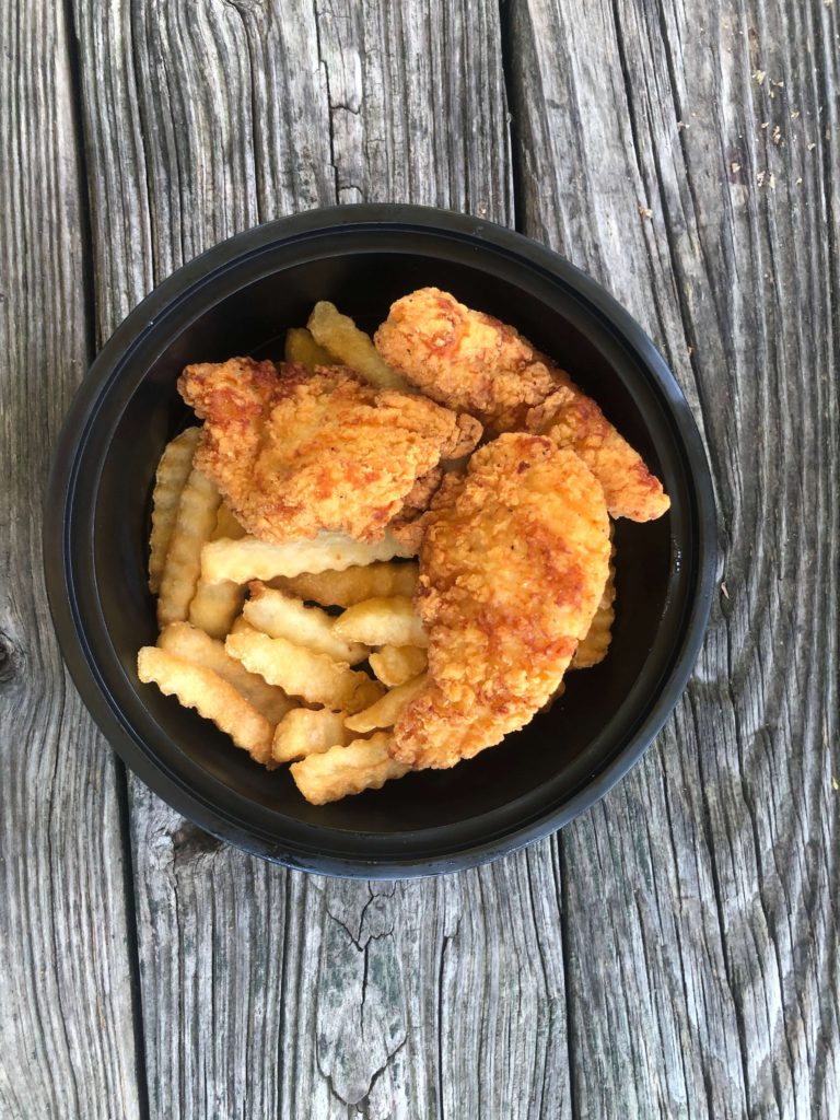 a kids meal from Pierce's Pitt Bar-B-Que featuring chicken tenders and crinkle-cut fries
