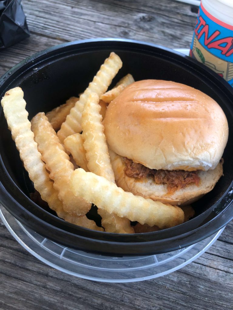 a kids meal from Pierce's Pitt Bar-B-Que  featuring a pulled pork barbecue sandwich and crinkle-cut fries