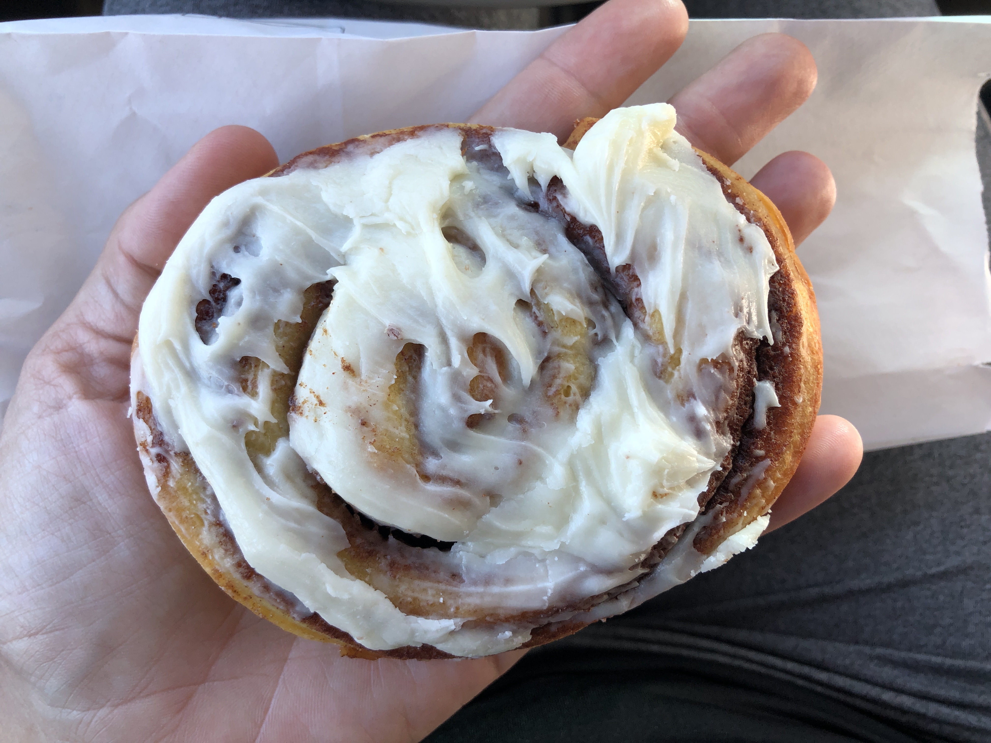 a giant cinnamon roll with cream cheese frosting from The Red Truck Rural Bakery
