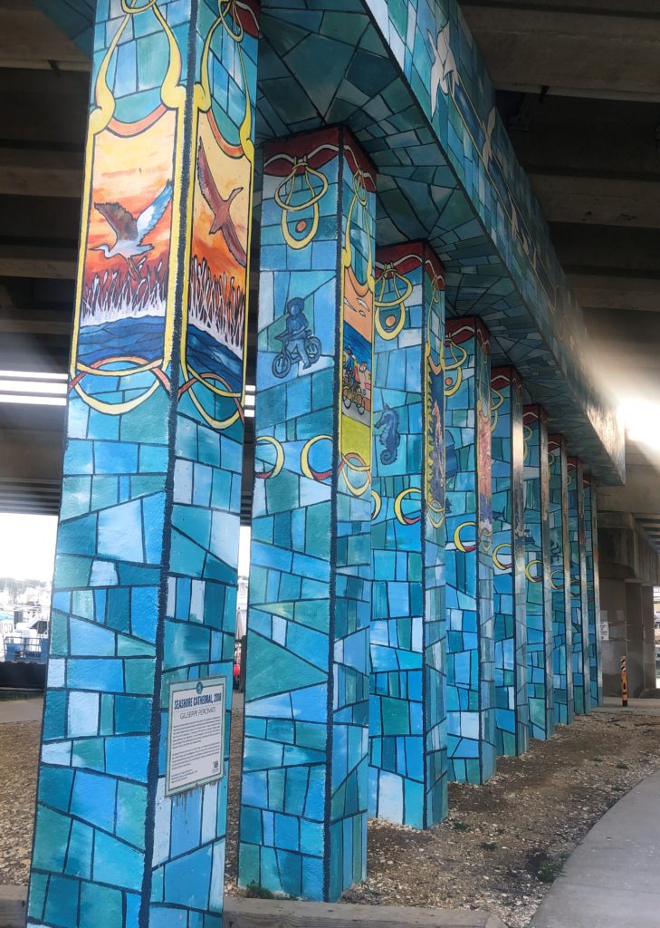 stained glass-style paintings on pillars at the Seahorse Cathedral in Virginia Beach