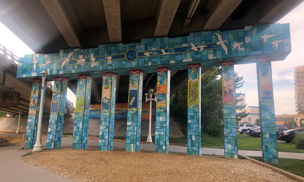 stained glass-style paintings on pillars at the Seahorse Cathedral in Virginia Beach