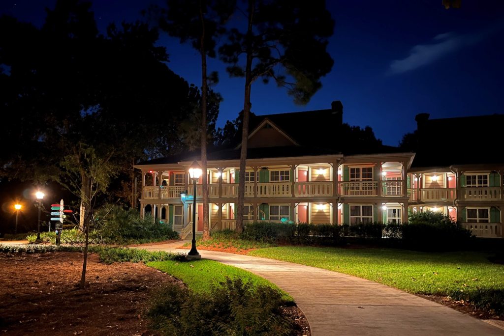 porch lights shine on a building in Alligator Bayou at Port Orleans Riverside Resort