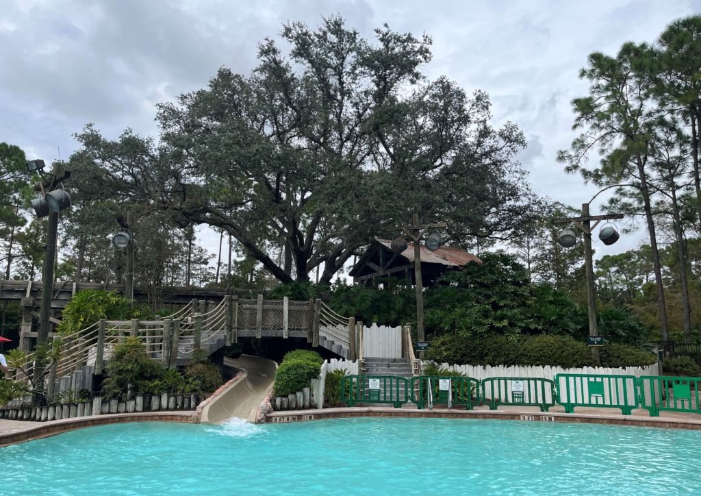 Ol' Man Island, the fishing hole-themed swimming pool at Port Orleans Riverside Resort, and the oak tree it is named for