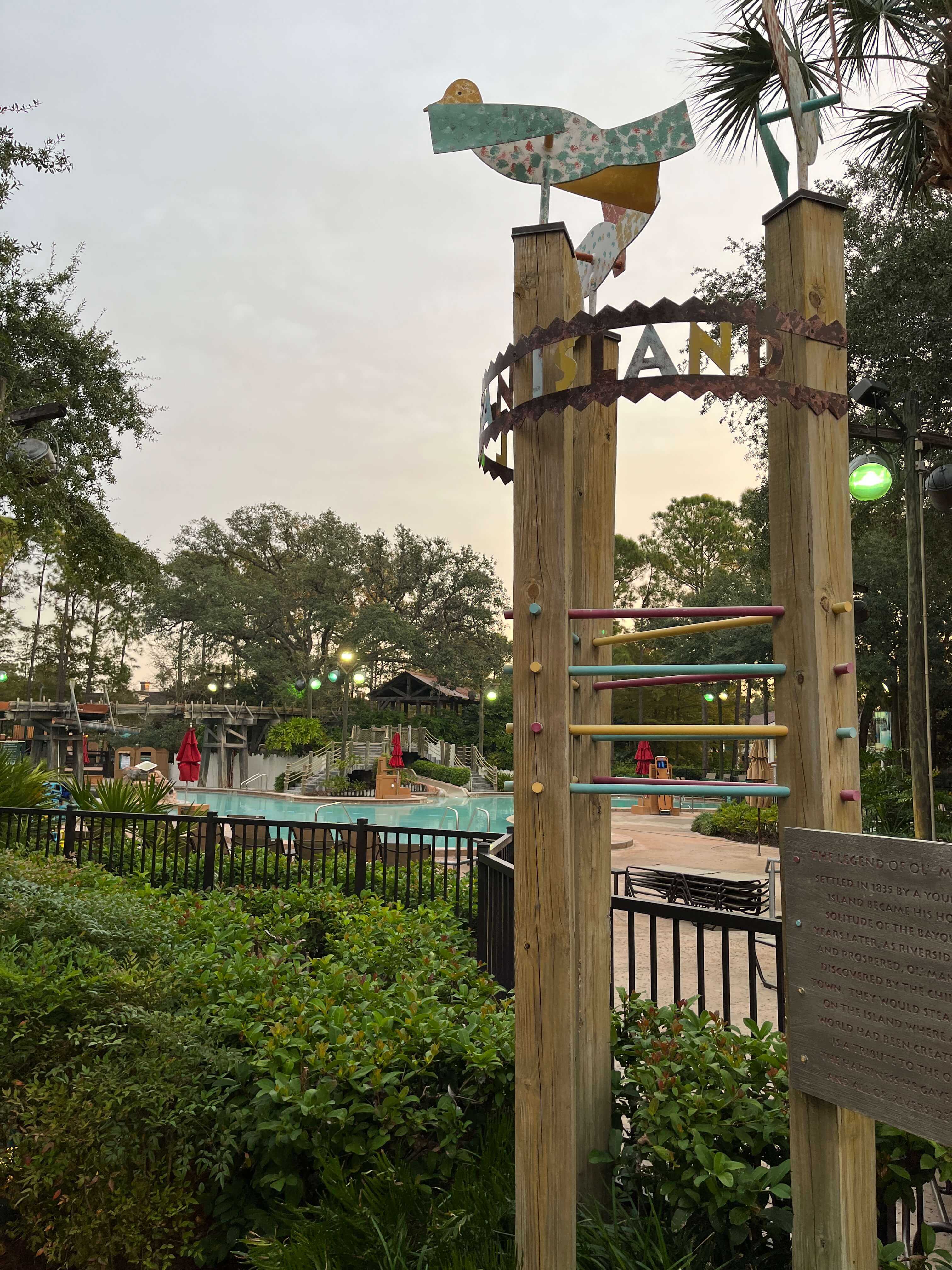 the welcome sign for Ol' Man Island is rustic and fun