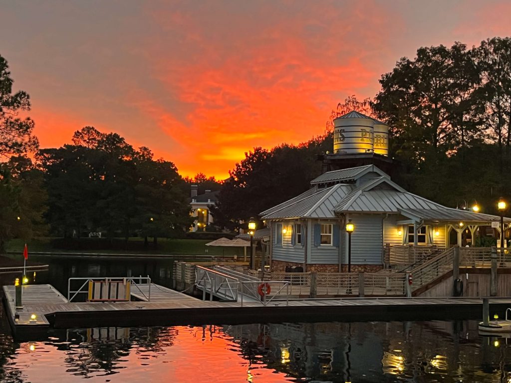 the docks and water tower at Port Orleans Riverside Resort at sunrise