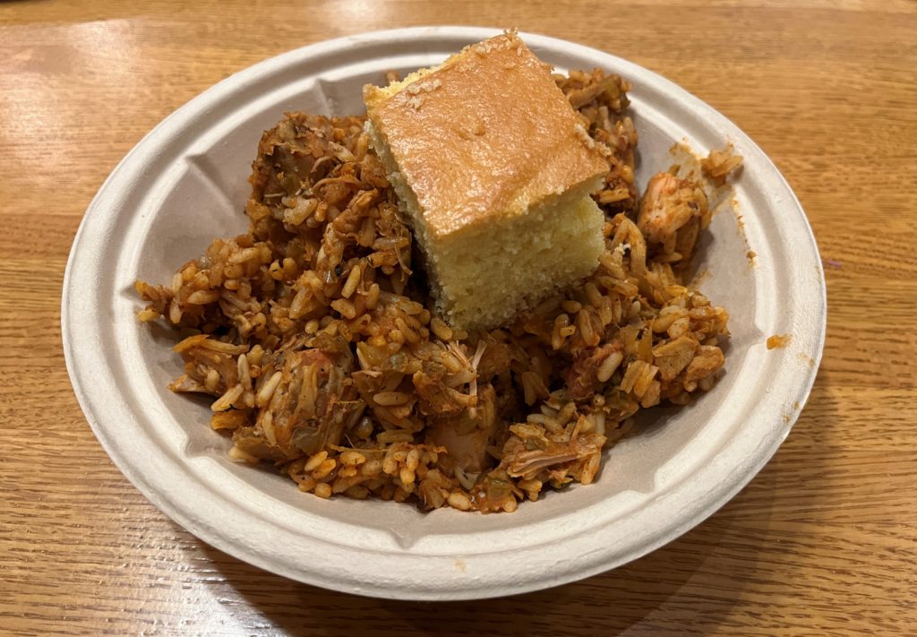a plate of jambalaya and cornbread at Riverside Mill and Market at Disney's Port Orleans Riverside Resort