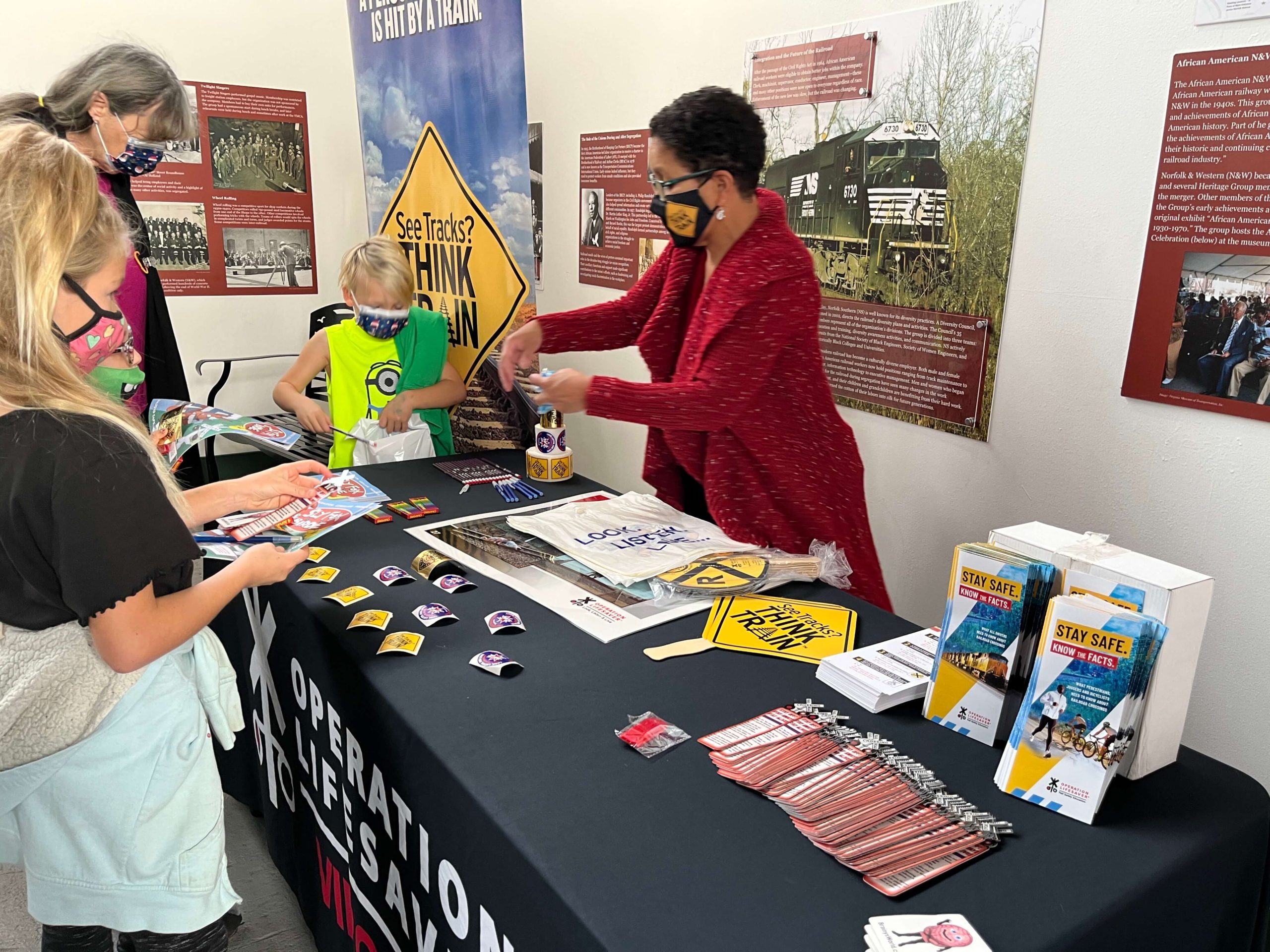 the Virginia Museum of Transportation gave out free literature, stickers, and coloring books to teach youngsters about train crossing safety