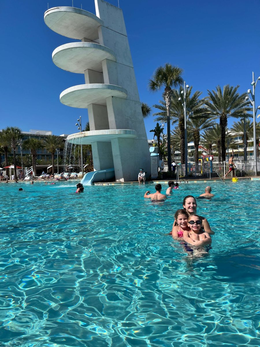 children in front of the slide at the Atomic pool at Universal's Cabana Bay Beach Resort
