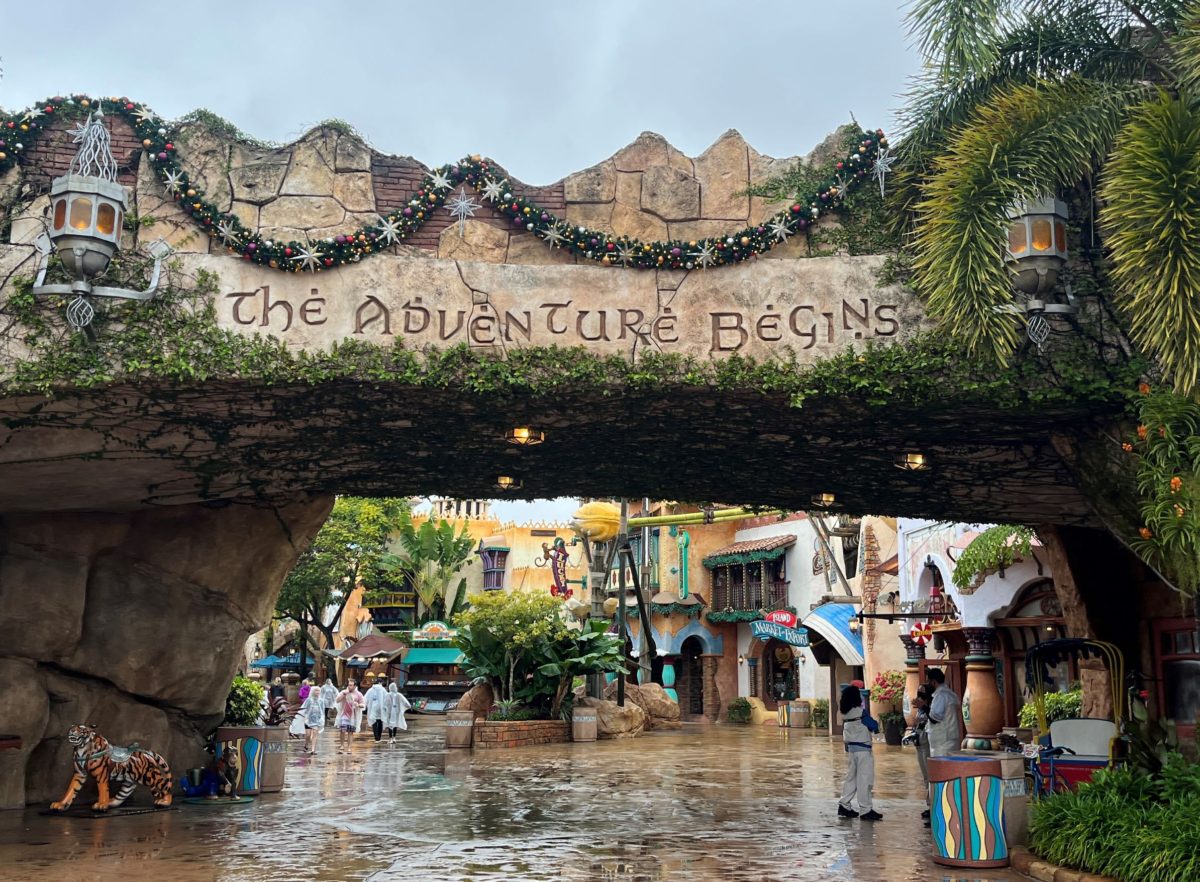 a carving in the face of a stone bridge reads "The Adventure Begins" at Universal Orlando's Islands of Adventure