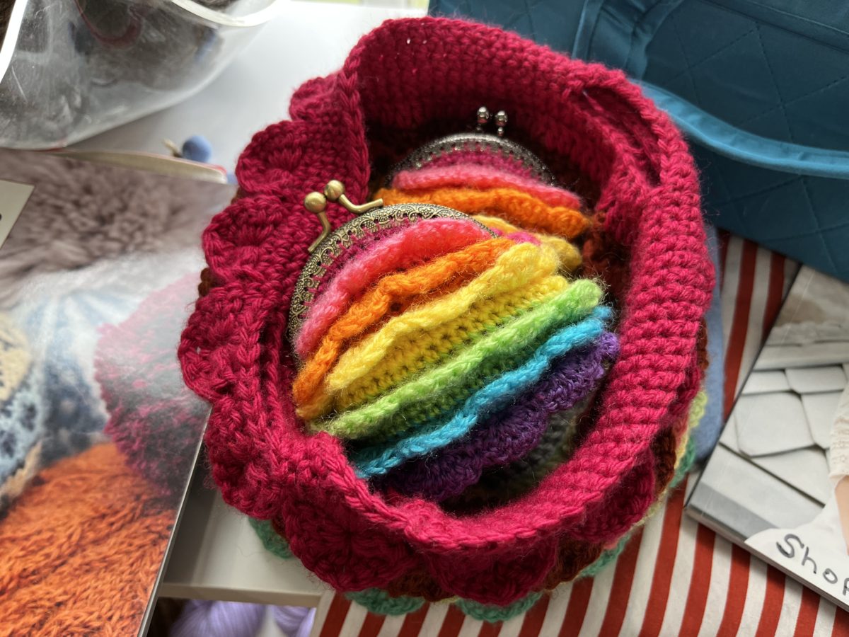 a hand-made coin purse at Two Rivers yarns local yarn shop