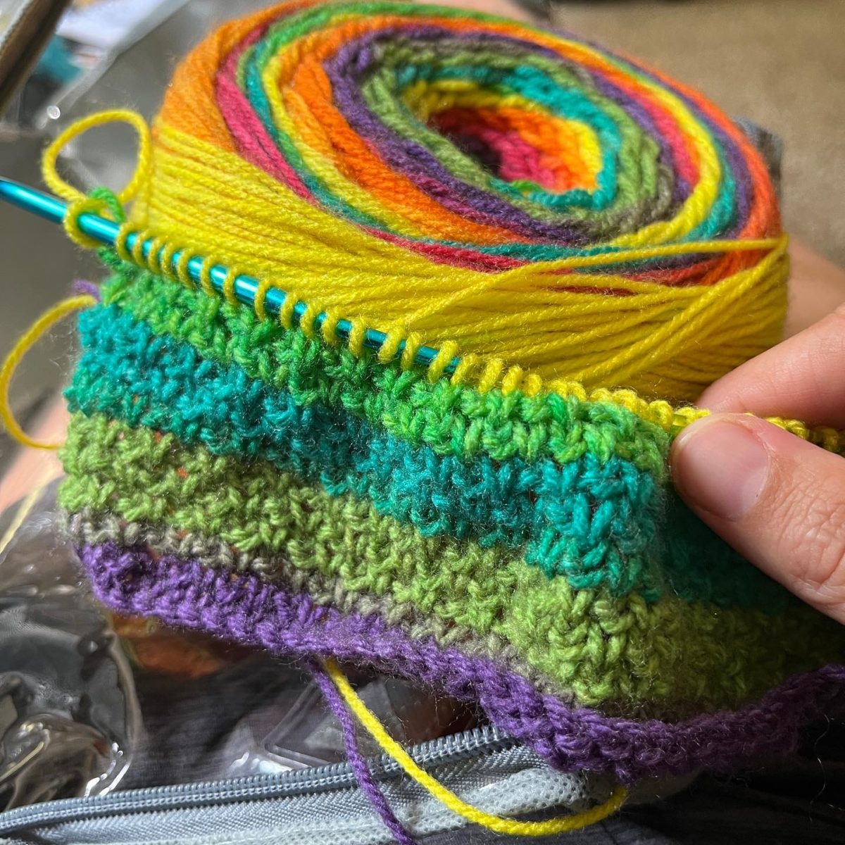 working with a cake of rainbow yarn: Caron Skinny Cakes yarn in Rainbow
