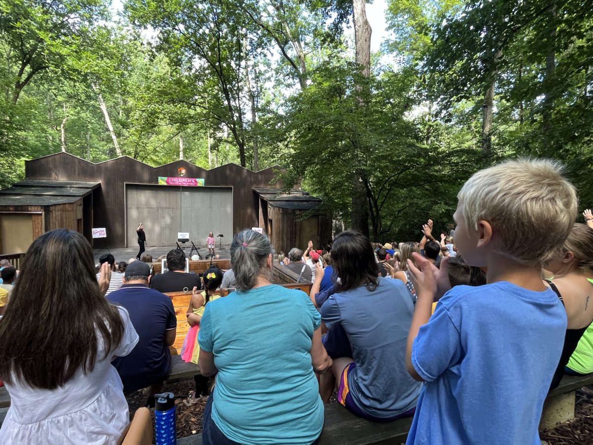 the audience applauds at the Children's Theatre in the Woods