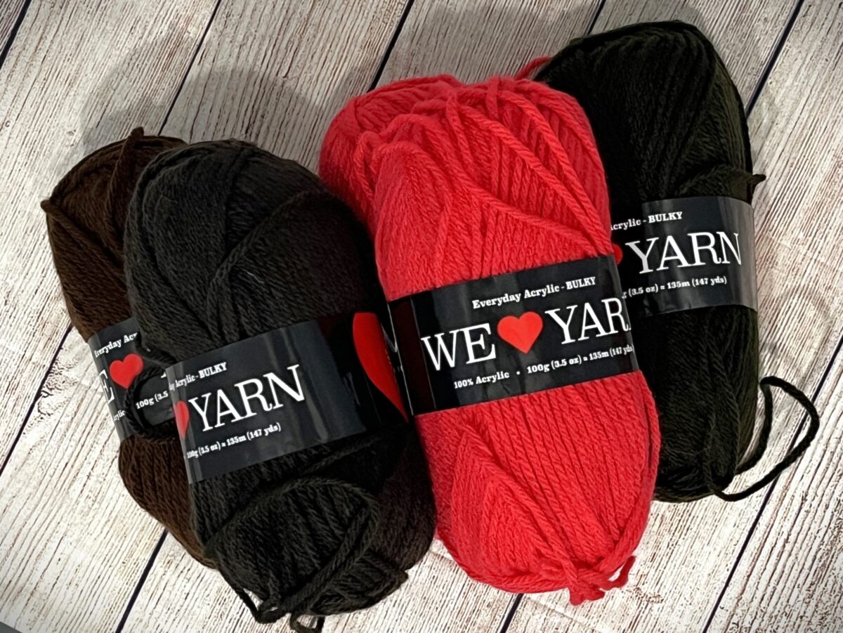 5 bullet skeins of acrylic yarn called "We Love Yarn" by Hobbii