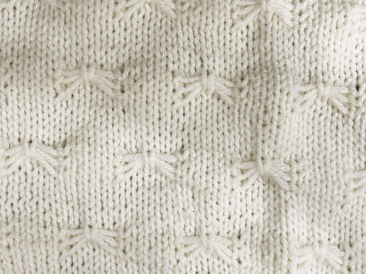 a knit panel featuring Butterfly Stitch